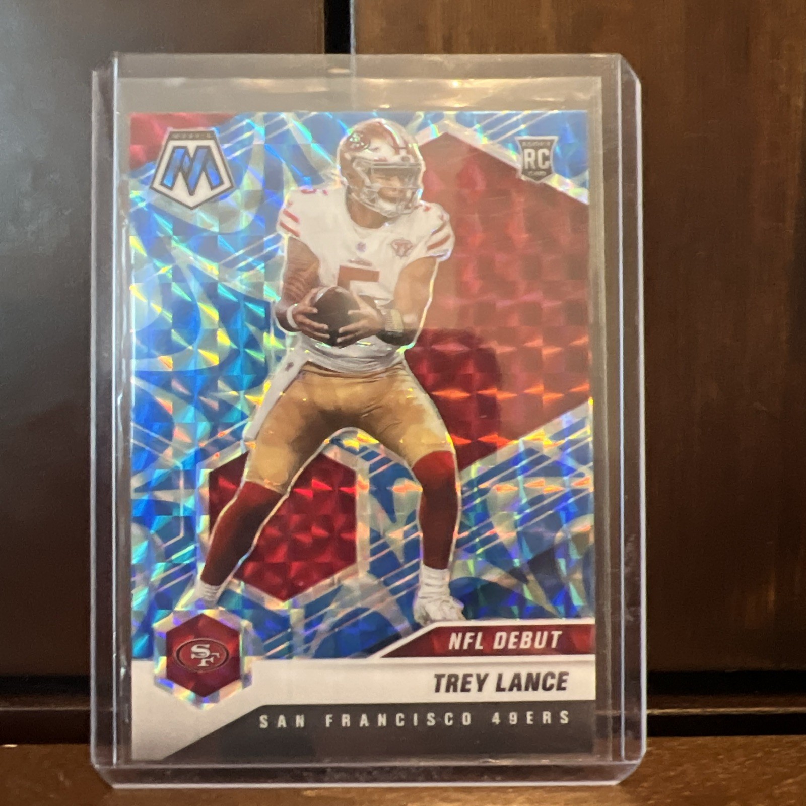 2021 Panini Mosaic - NFL Debut Trey Lance #244 Reactive Blue Mosaic Prizm (RC)