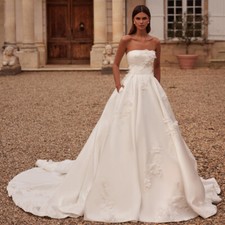 A Line Strapless Satin Wedding Dresses 2024 Sleeveless Beaded Bridal Gowns