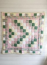 Handmade baby crib quilt green, yellow, white, and pink 39in by 42in
