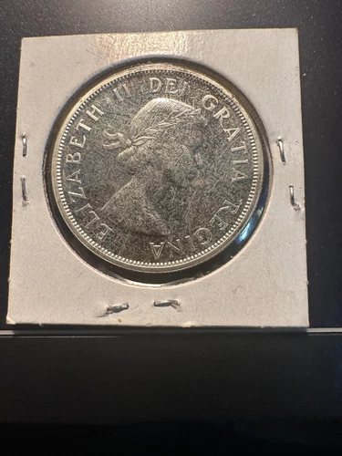 CANADA 1963 AU one dollar .800 Silver Coin (253)