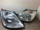 2003 FORD FIESTA PASSENGER & DRIVER SIDE FRONT HEADLIGHTS PAIR