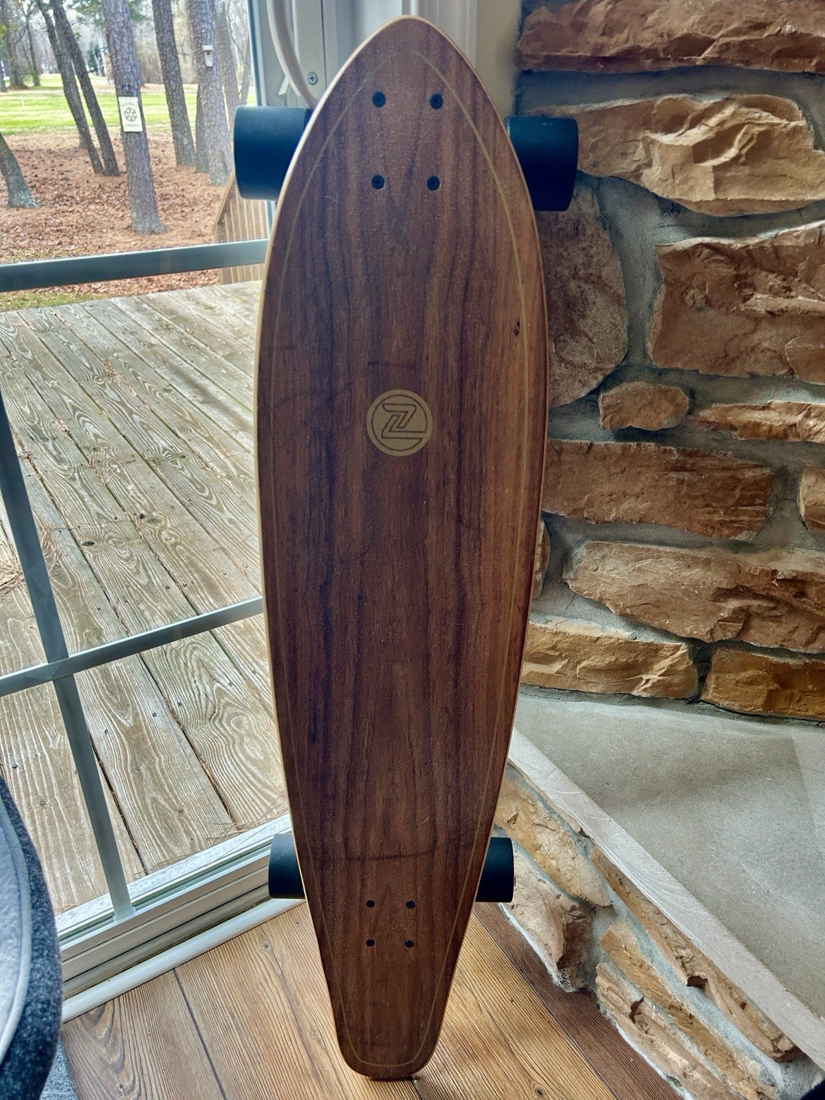 Z-Flex Ruins to Roses Roundtail longboard.