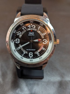Q&Q by Citizen A148J305Y Standard Analog Black Dial Men's Watch. 