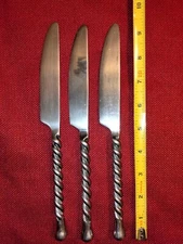Heavy twisted handle table knives 9.3" silverware 3 piece set, unmarked good