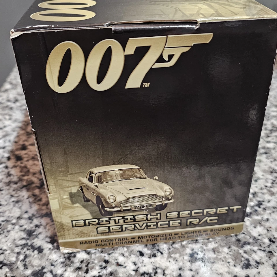 NOS NIB 007 Aston Martin DB5 Goldfinger British Secret Service RC - 2012 - Image 4 of 4