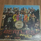 The Beatles Sgt. Pepper's Lonely Hearts Club Band Capitol 12" Black Vinyl LP