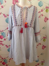 zara striped dress with pom poms