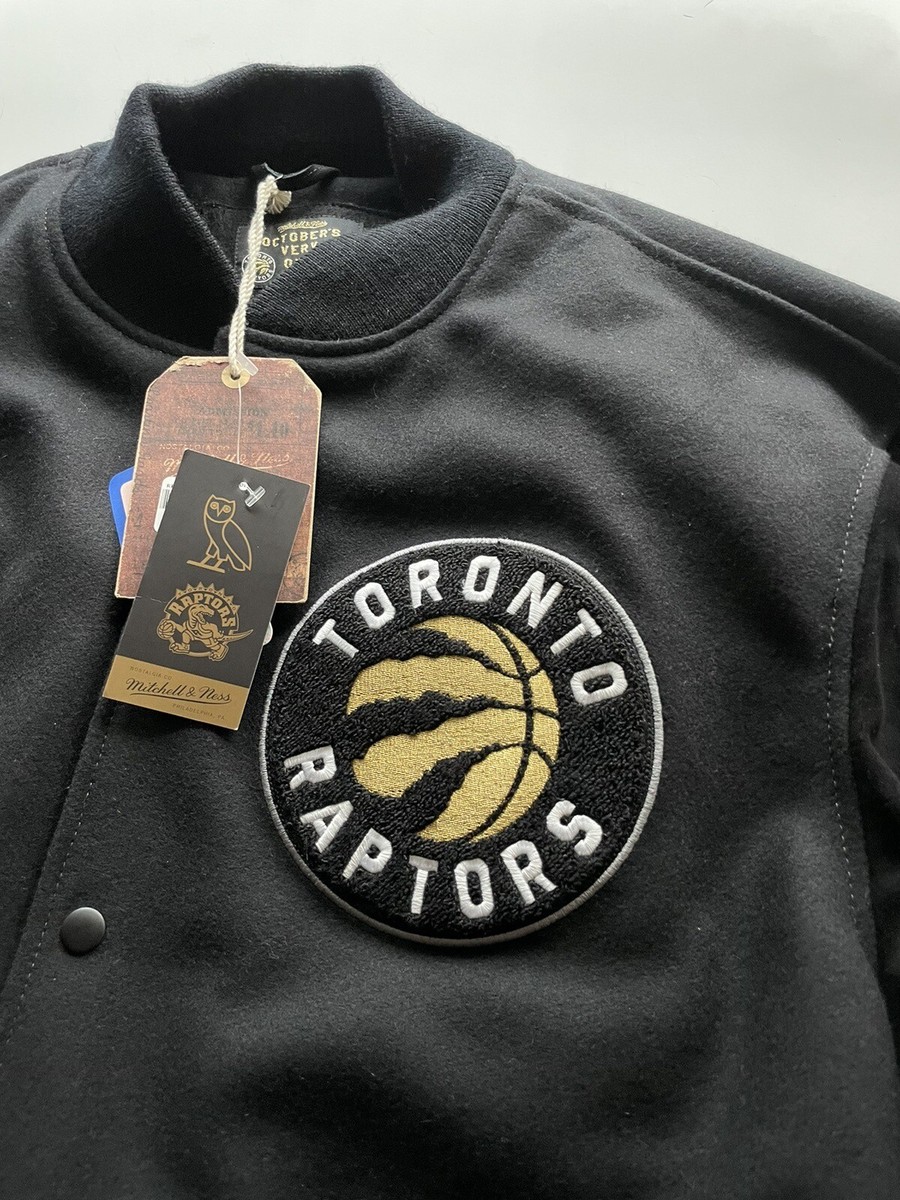 $1199 OVO x Mitchell & Ness Toronto Raptors Black Varsity Jacket
