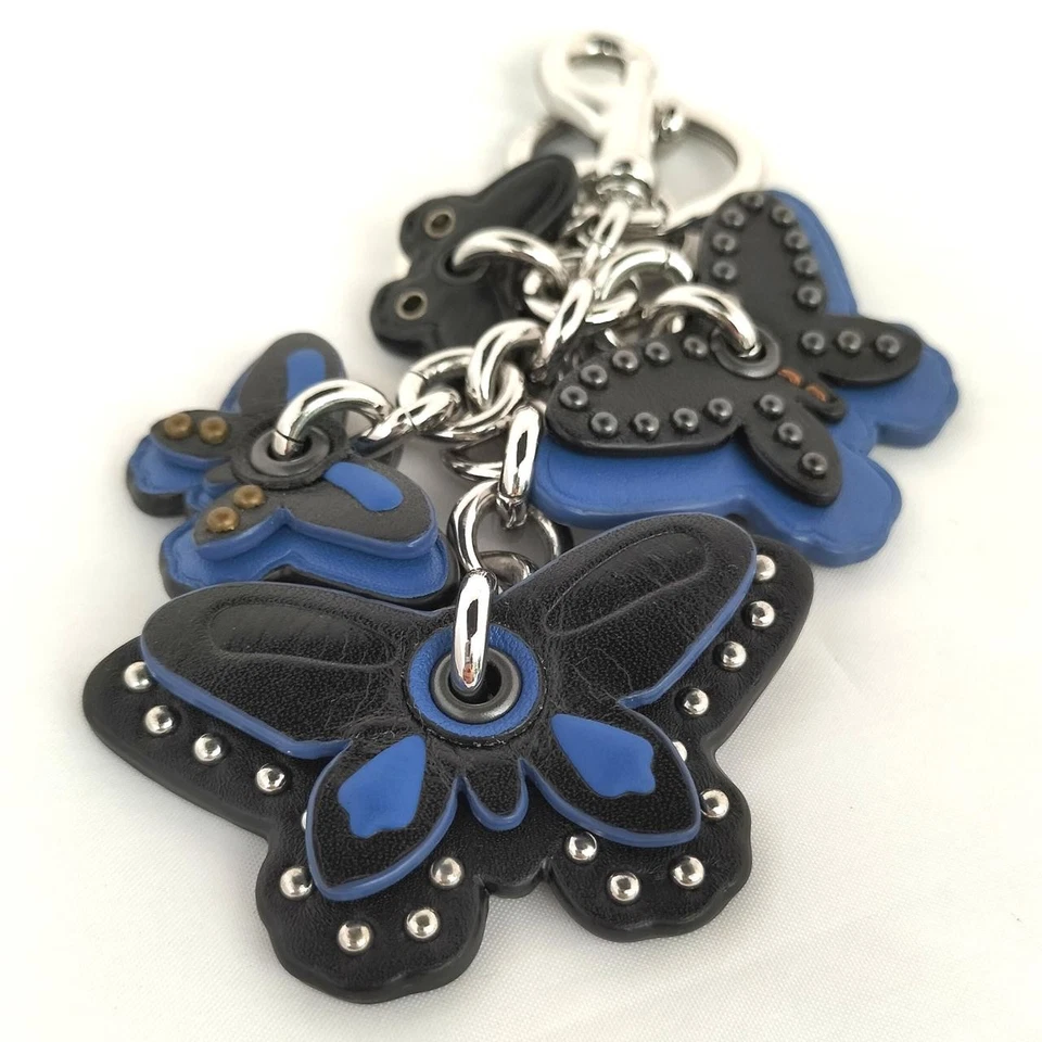 COACH Dije Mariposa Cuero Azul Llavero Dije Mariposa Silueta Foto 2 de 4