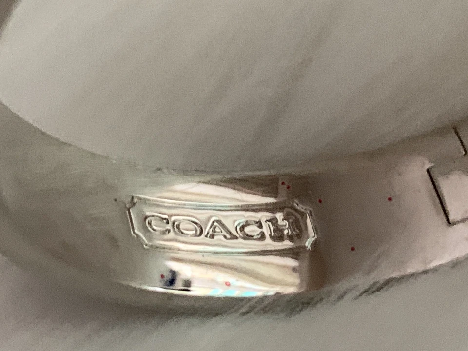 BRAZALETE ANCHO AUTÉNTICO COACH FIRMA LOGO ESMALTE MORADO Lunares Foto 2 de 4