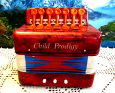 Child Prodigy Accordion ~ Red Pearlescent ~ Seven Metal Keys ~ Straps