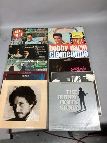 11 Vinyl Records - Buddy Holly, Chubby Checker, Elvis Presley, Simon & Garfunkel