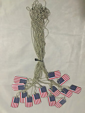 Fourteen dog tag type United States flag necklaces