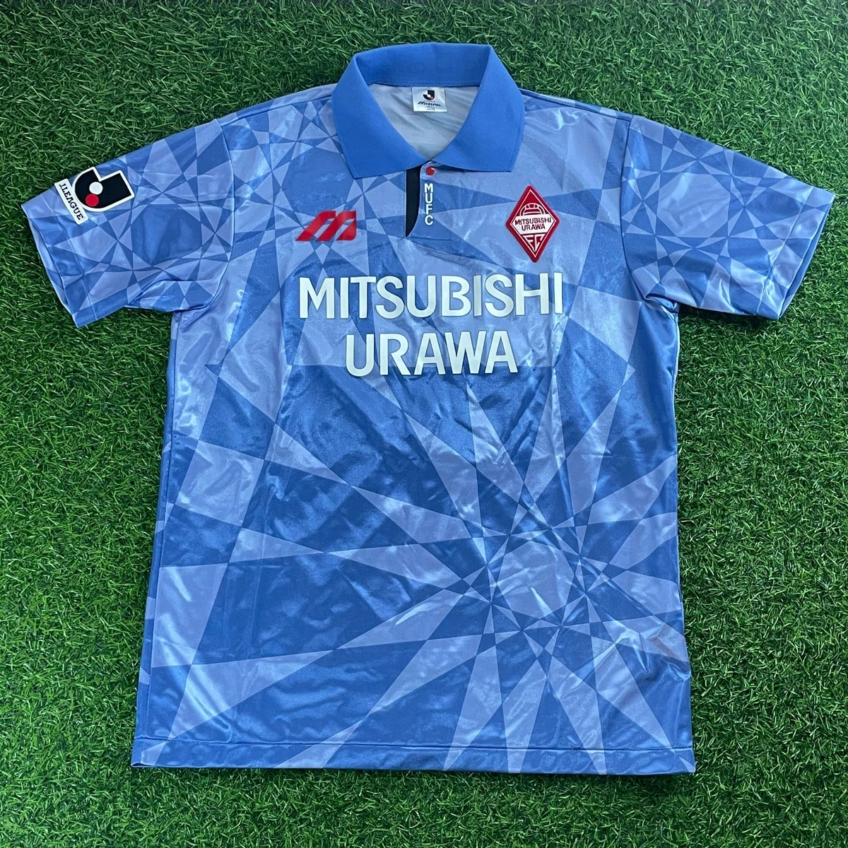 Preços baixos em Tamanho L Urawa Red Diamonds International Club