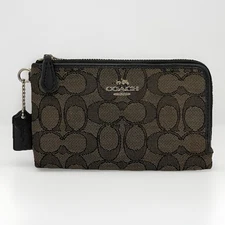 the Coach Corner Pouch wallet in Signature Canvas 64370 Brown Black
