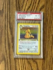 1999 Pokemon Fossil #4 Dragonite - Holo PSA 8  --  1st Edition