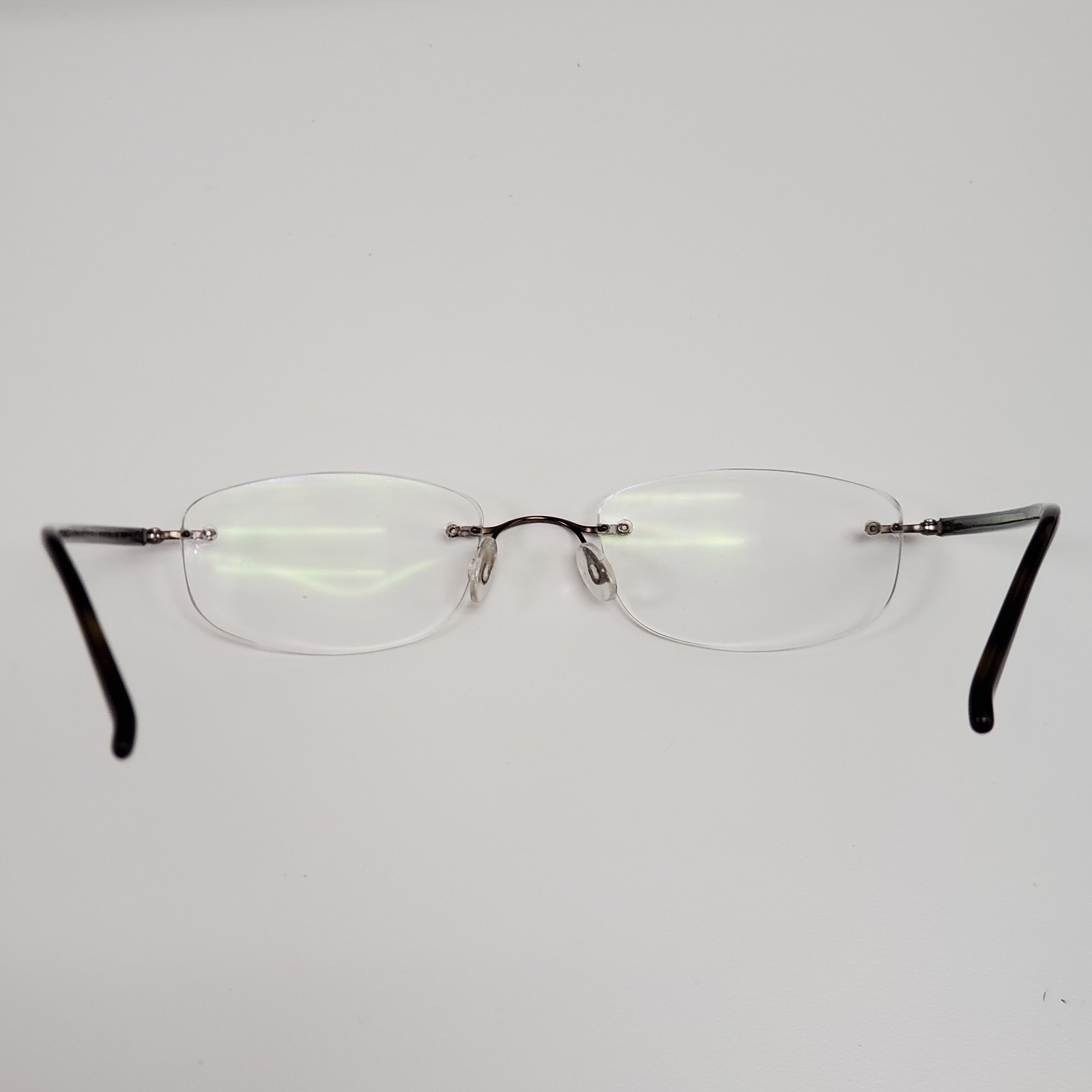 Marchon Airlock 2 770 Eyeglass Frame Brown 51 20 135 Rimless