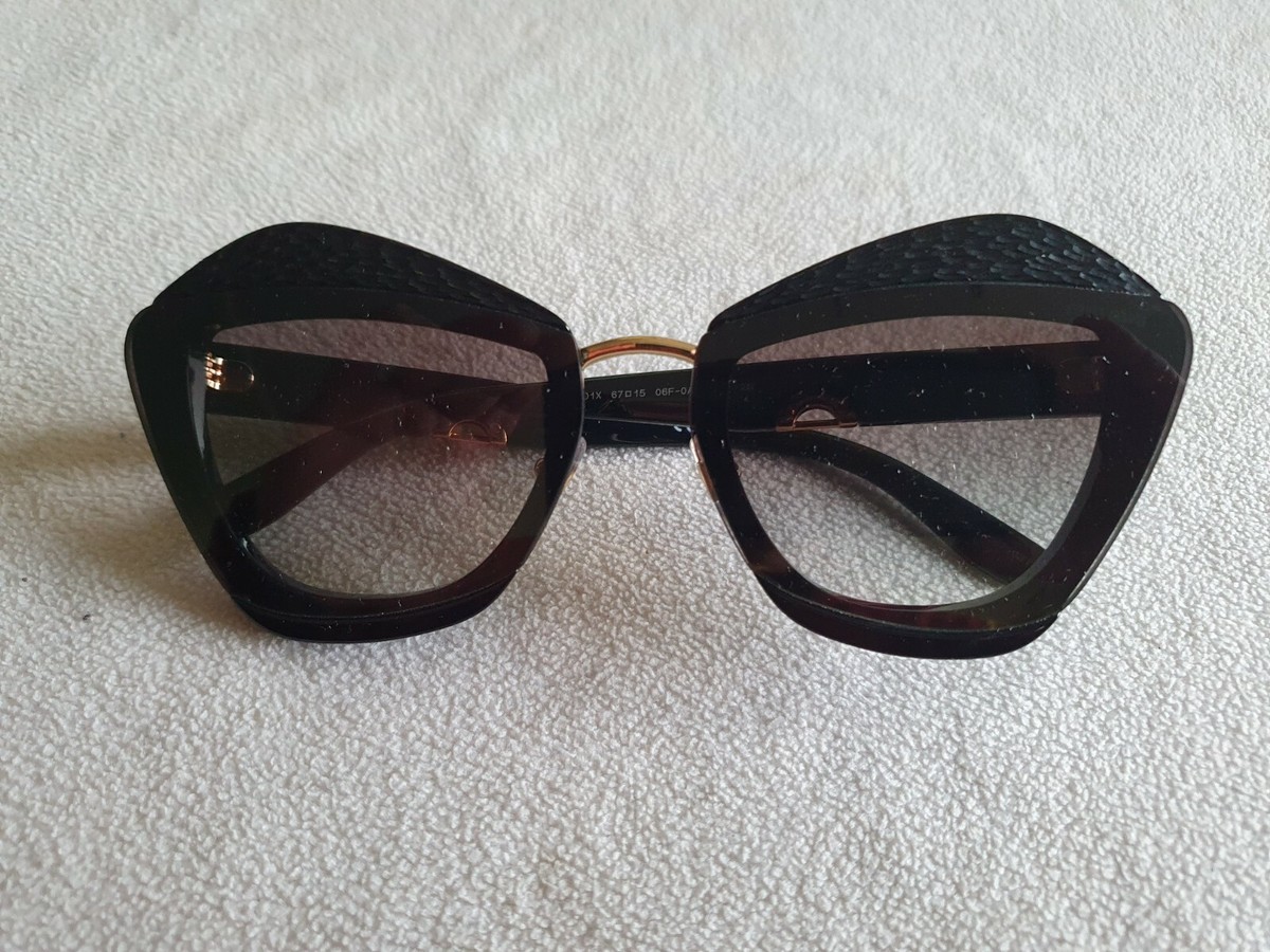 Miu Miu sunglasses AUTHENTIC SMU 01X NWOT Miu Miu black frame sunglasses. SMU 01X 06F-0A7. New. | eBay main image 3
