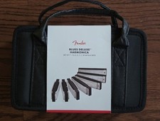 BRAND NEW SET OF 7 FENDER BLUES DELUXE HARMONICAS WITH CARRYING CASE
