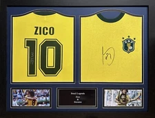 FRAMED WORLD CUP LEGENDS SOCRATES & ZICO SIGNED BRAZIL SHIRTS WITH PROOF COA
