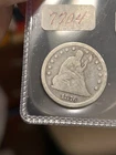 1876 CC SEATED LIBERTY QUARTER