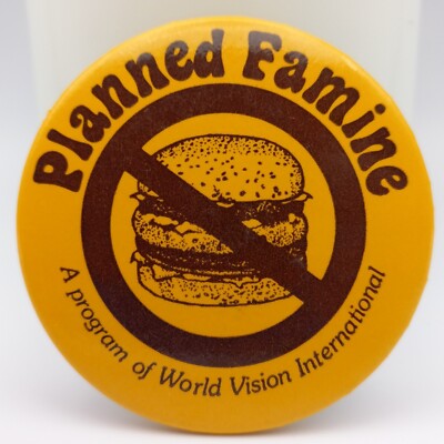 Vintage World Vision International Pinback Button Planned Famine Anti Hamburger 
