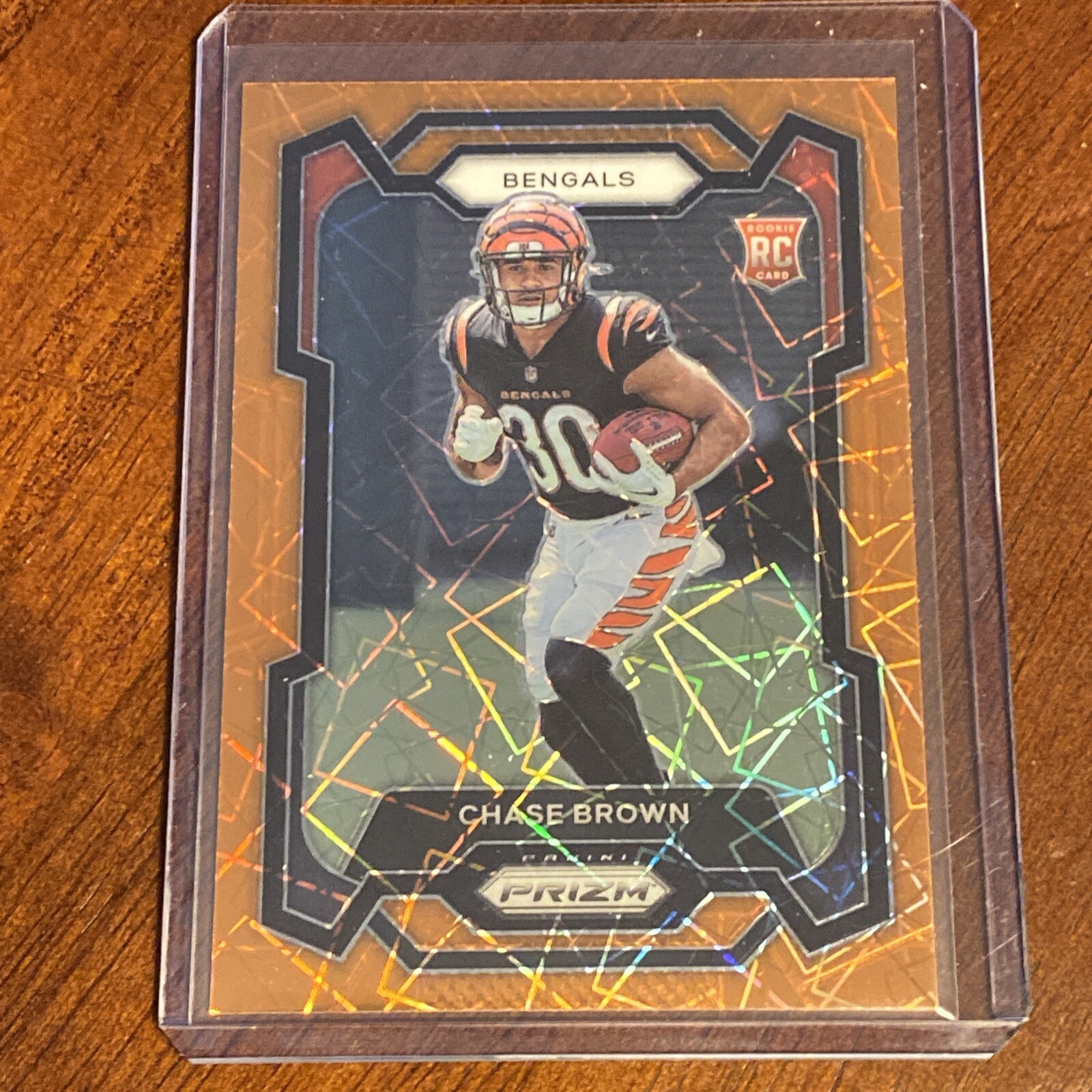 2023 panini prizm CHASE BROWN RC Orange Laser Prizm SP Bengals #318