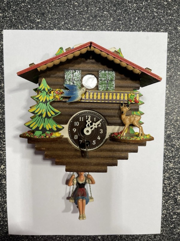 Vintage Key Wound Mini Bouncing Girl Chalet Style Clock