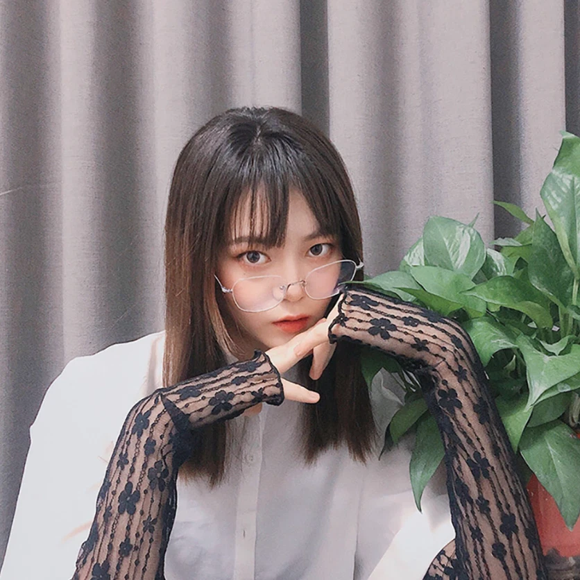 Guantes largos de encaje huecos sin dedos mangas de protección solar malla encaje Foto 2 de 3