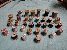 Lot of 34 vintage wood thread spools with thread variety of colors and size