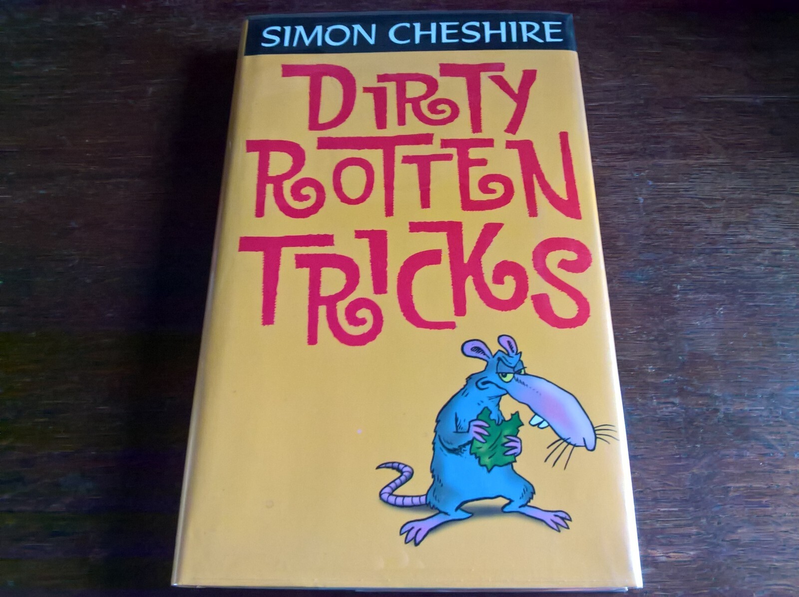 Dirty Rotten Tricks by Simon Cheshire 1st edn hb dj children's fiction