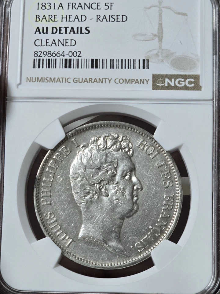 Moneda de 5 francos 1831A Francia cabeza desnuda levantada RARA NGC AU detalles limpiados  Foto 3 de 3