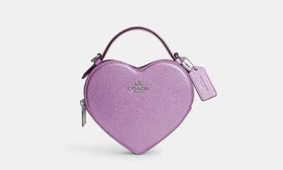 coach♡ショルダーバッグ♡ピンク♡ラベンダー♡パープル A love note in bag form! COACH blends romantic details with