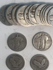 Silver standing liberty quarters, sixteen coins.