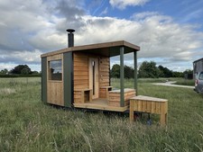 sauna cabin for outdoors on wheels and log fired