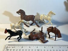 Assorted group of six plastic play set horses with NO tails as shown