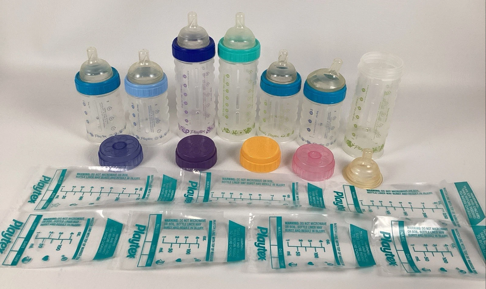 Playtex Baby Bottles 4 Oz 8 Oz Drop Ins Nursers Clear Nipples Lot 7 Vintage 2005
Opens in a new wind