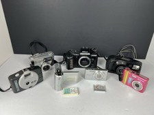 Lot of 8 Cameras Parts/Repair - Nikon, Sony Cybershot,Polaroid, Bell  Howell