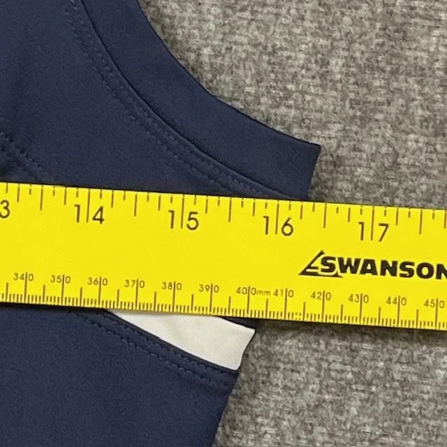 Camiseta sin mangas Nike para mujer pequeña azul marino Dri-FIT ribete blanco tenis atlético Foto 4 de 4