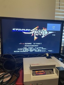 Strider Nintendo NES Cartridge With Manual Tested