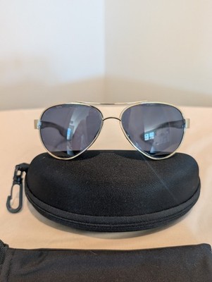 Costa Del Mar Loreto polarized sunglasses with a gold-tone frame and gray lenses
