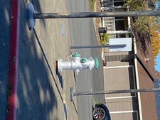 green and silver fire hydrant B90210