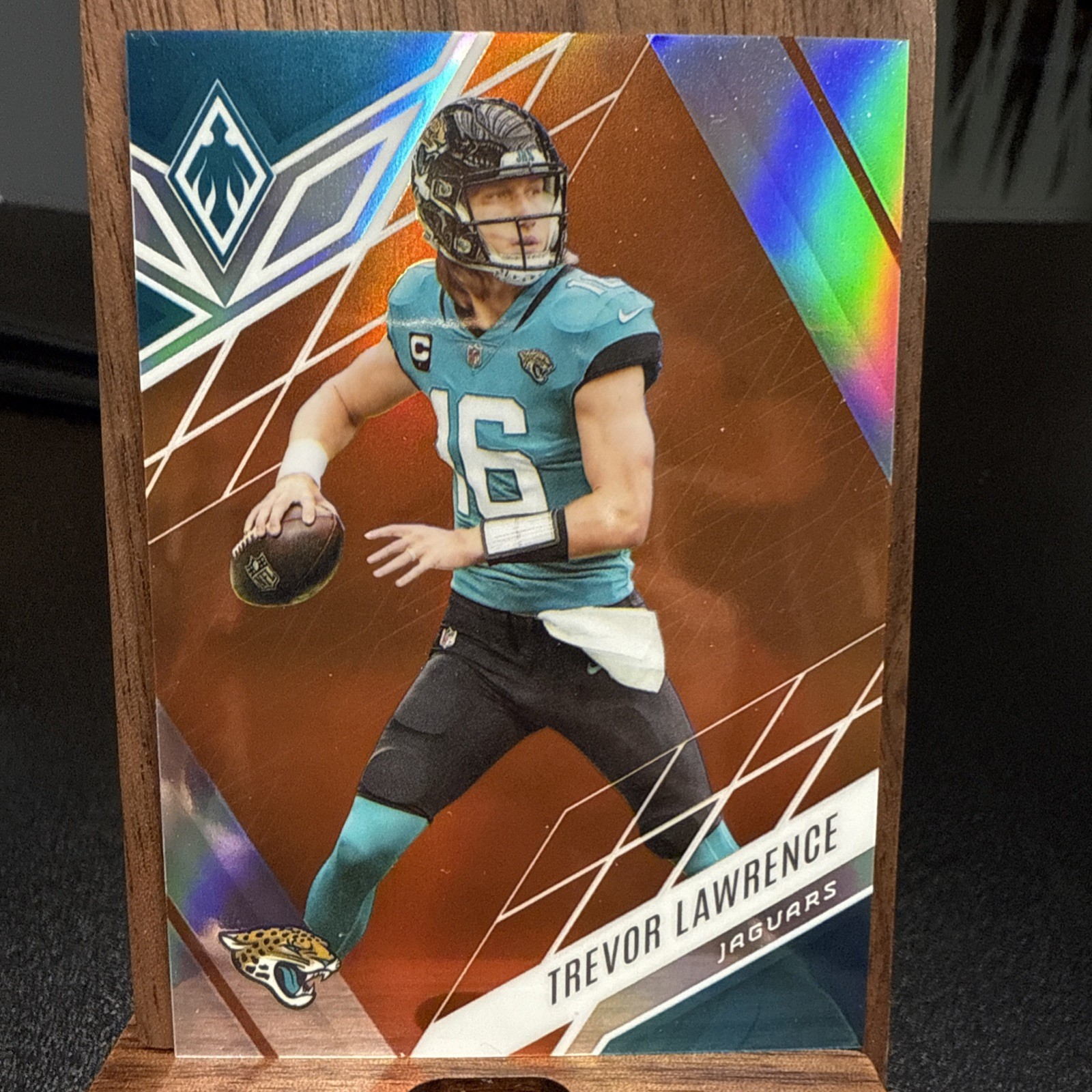 2022 Panini Phoenix - Trevor Lawrence #33 Orange /99 Jacksonville Jaguars QB