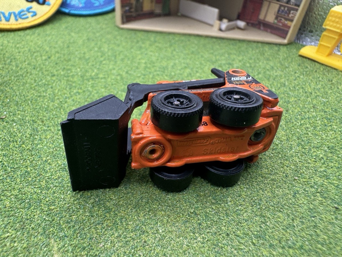 2009 Matchbox Skidster Orange KING J Bucket Construction Skid CAT