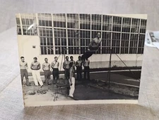 Shirtless  young Guys muscles press.