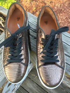frye gold sneakers
