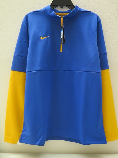 blue and gold nike shirt