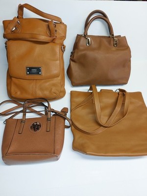 L0T OF 4 BAGS. 1 GUESS Mini. 1 Rockport Tote .  1 DKNY Satchel. 1 Vince Camuto