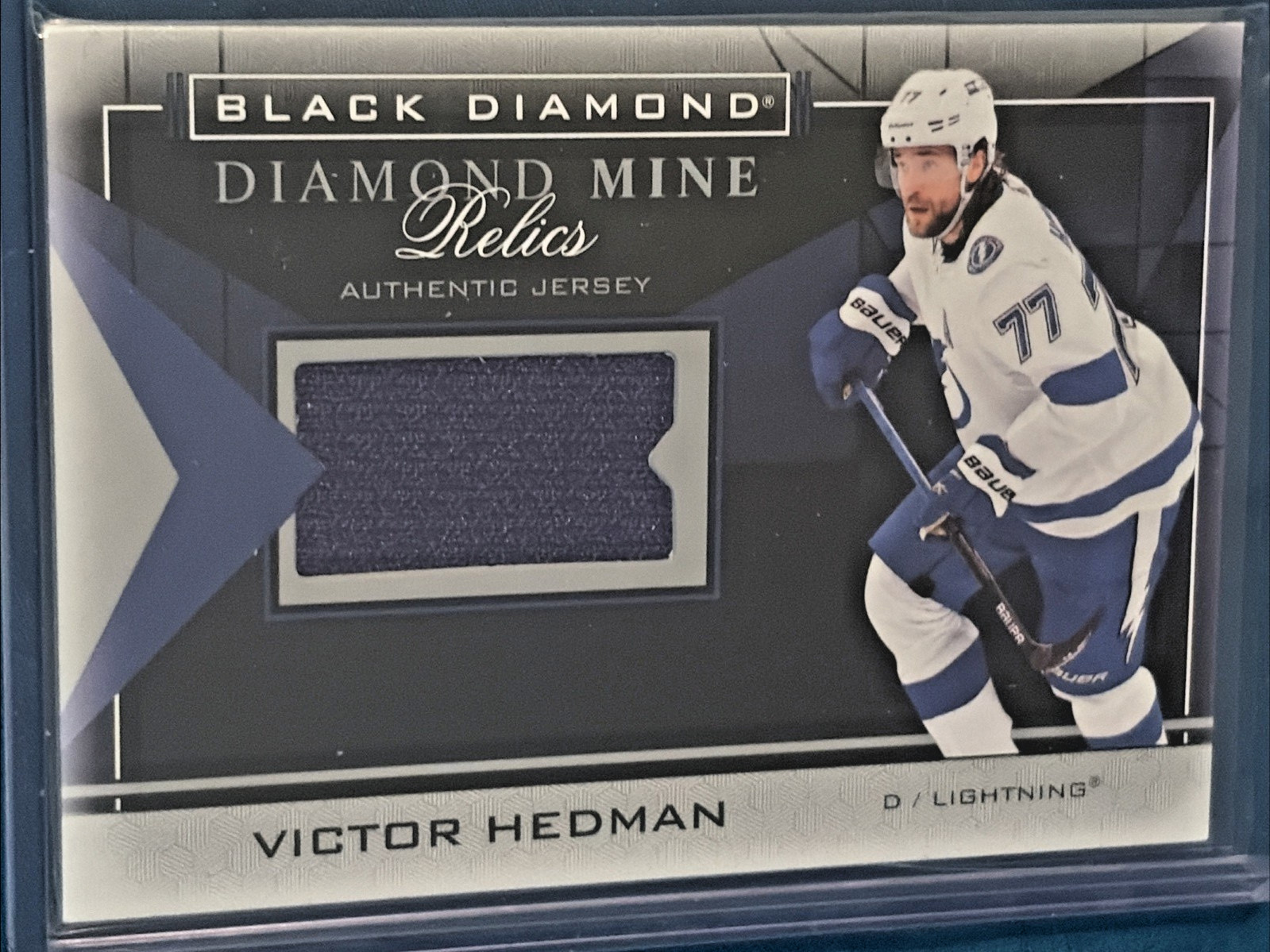 Victor Hedman #DMR-VH Hockey Cards 2021 Upper Deck Black Diamond Mine Relics trading card — raw and PSA graded price guide