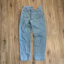 Vintage 80s Levi's 550 orange tab denim jeans in light wash - 30x30
